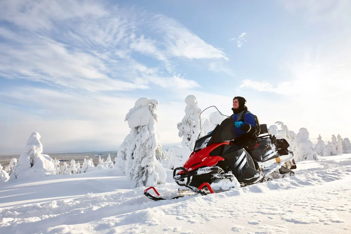 Guided snowmobile safari to the sunny winter wonderland. Rovaniemi, Lapland. | Wild About Lapland